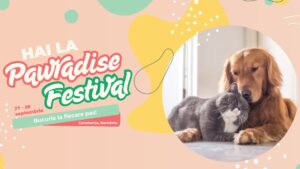 Un câine și o pisică stau îmbrățișați pentru posterul evenimentului