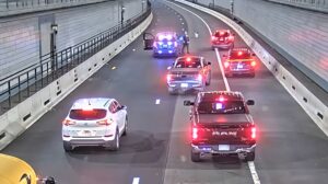 Mașini în trafic într-un tunel din Boston, SUA